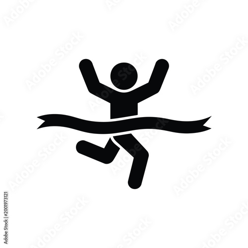 A silhouetted athlete crosses a finish line with arms raised in victory