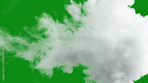 A vibrant green screen background features a subtle, animated white cloud drifting gently across the frame, ideal for visual effects and compositing.