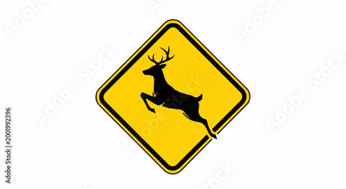 Yellow diamond-shaped sign with a black silhouette of a leaping deer