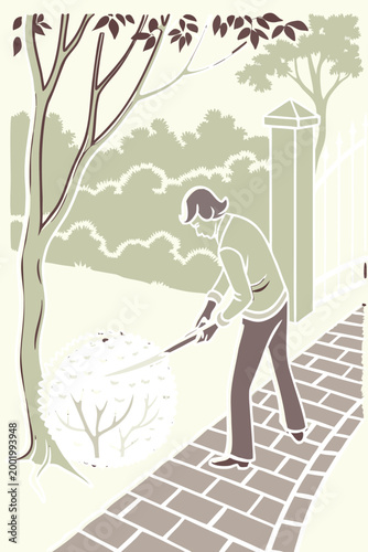 Person using hedge shears to trim a tall garden hedge