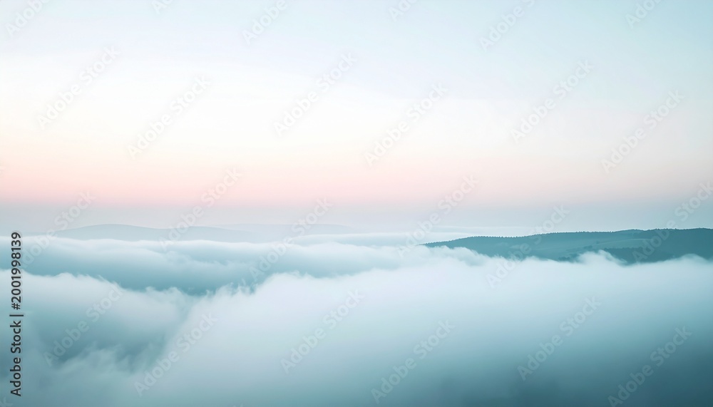 Fototapeta premium Ethereal landscape of clouds and sky at sunrise, a serene vista.