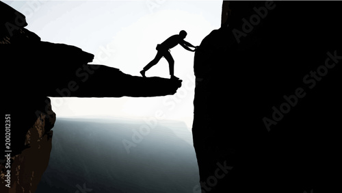 Silhouette of a person pushing a rock on a cliff edge, symbolizing challenge and determination