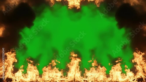 A vibrant green screen background is dramatically framed by swirling flames and dark smoke, creating a dynamic and intense visual effect.
