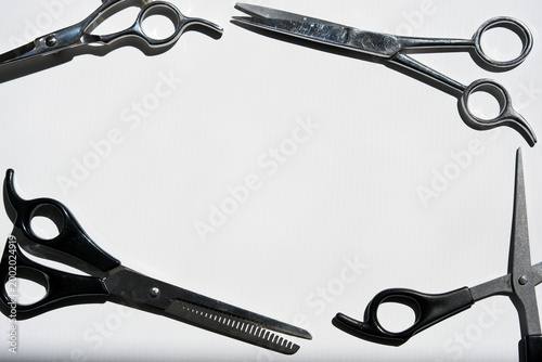 Hairdressing Scissors Set Framed on White Background