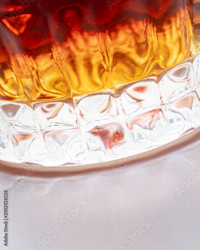 Tilted Whiskey Glass With Ice Vertical Premium Drink Concept