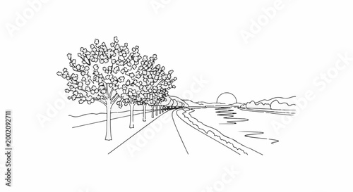 Lined road beside water with sun setting behind distant hills