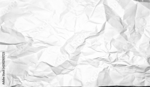 Halftone crumpled paper texture with black a dotted, rough, and wrinkled surface. Wite creased sheet background in comic pop-art style, featuring grainy folds and gritty distressed details.