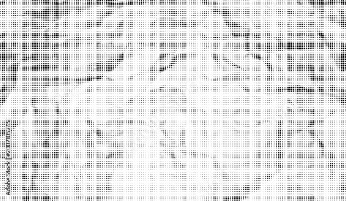Halftone crumpled paper texture with black a dotted, rough, and wrinkled surface. Wite creased sheet background in comic pop-art style, featuring grainy folds and gritty distressed details.