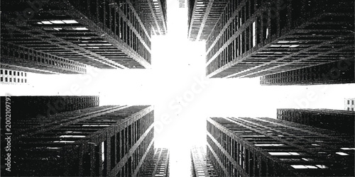 Low angle view of tall modern city skyscrapers looking up towards the bright sky in the business district