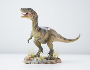 Detailed studio photograph of a prehistoric carnivorous dinosaur figurine, showcasing intricate craftsmanship and the powerful presence of ancient reptiles in a collectible model