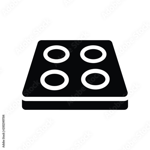 Modern electric stovetop with four cooking zones, sleek black surface, and white heating elements, Minimalist glyph kitchen design.