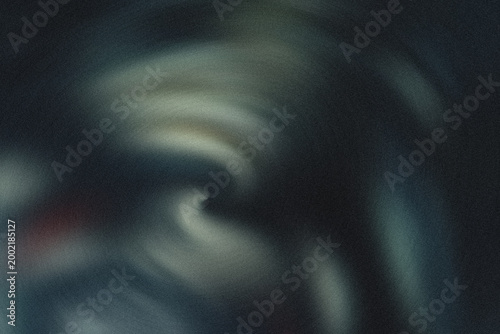 A dark and blurry image with shades of green and white light