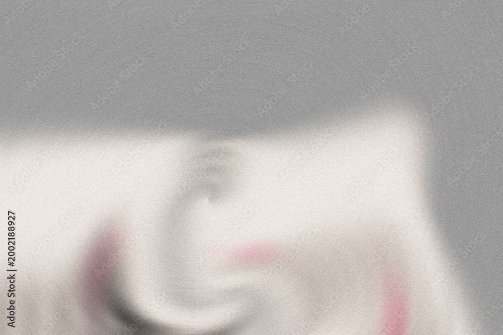 Obraz premium Blurry white and red abstract image on gray background