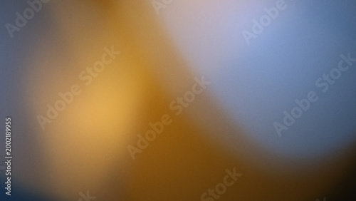 Abstract Yellow complementary gradient background texture, 2 colors, soft grainy with minimalist organic glowing fluid forms.