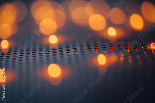 a close-up of the glowing dots on an oven door, with soft focus on one edge