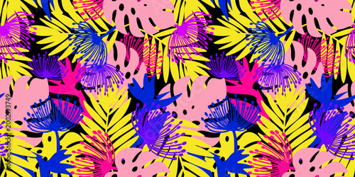 neon tropical seamless pattern with monstera leaves and exotic flowers on black background bold clashing colors for summer textile design