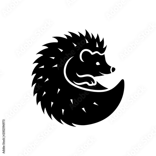 A striking black depiction of a curled hedgehog showcasing its spiny exterior silhouette