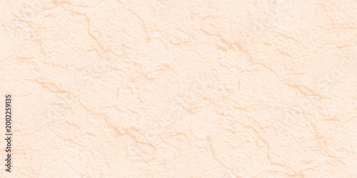 Pale peach textured stone wall background with subtle grain and natural plaster finish for minimalist interior design