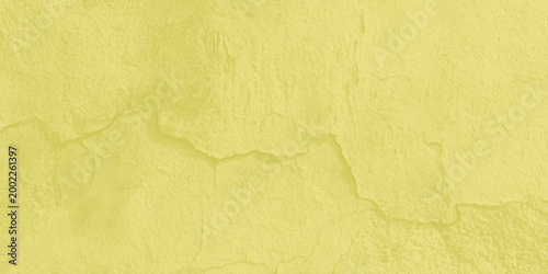 Pale Yellow Textured Plaster Background with Subtle Cracks and Grainy Concrete Cement Wall Surface