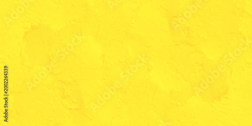 Vibrant yellow textured background with abstract stucco plaster effect and bright sunny matte finish for creative design