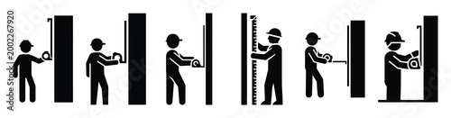 Set of minimal black shape  worker measuring wall silhouette icon. construction icons in black isolated vector illustration collection