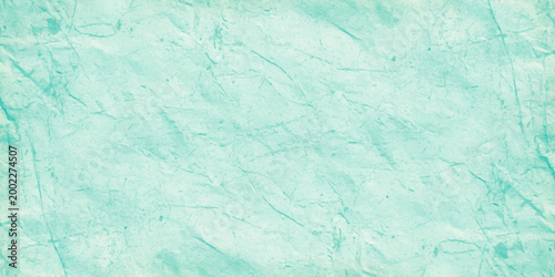 Light teal marble texture background with soft white veins and ethereal crumpled paper effect for elegant web design