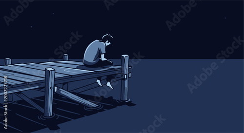 A man sitting alone on a dock at night.