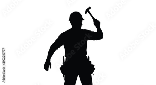Silhouette of a construction worker swinging a hammer with a tool belt