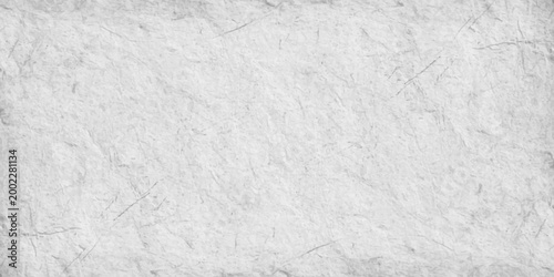 White crumpled paper texture background with subtle marble stone effect, light gray abstract parchment surface