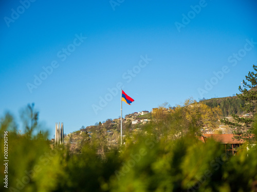 Canvastavla Armenian flag on tall flagpole in the sky over Dilijan, Tavush Province, Armenia