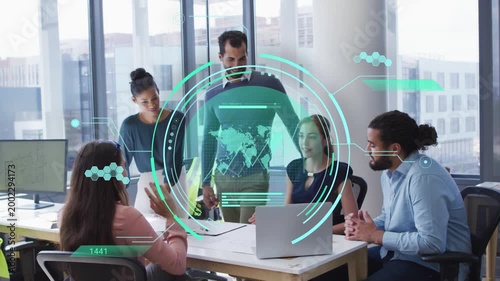 Five business team pointing at docs and laptop, analyzing data while HUD appearing tracking charts