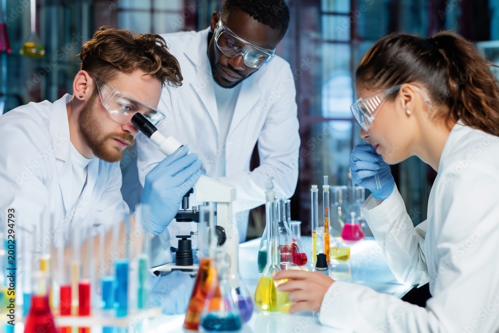 Fototapeta premium Scientists Conduct Experiments in Laboratory Using Microscope and Test Tubes for Research and Analysis