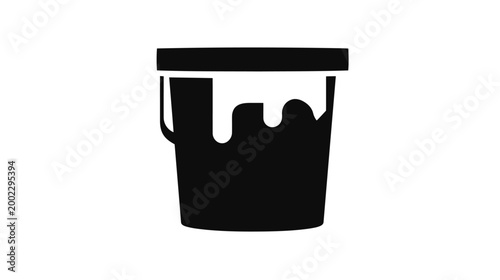A minimalist black silhouette icon depicting a paint bucket with paint overflowing or splattering around its rim.