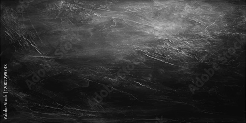 abstract grayscale texture, evoking a sense of depth and mystery with its swirling patterns and tonal variations, perfect for adding a touch of sophistication to design projects.
