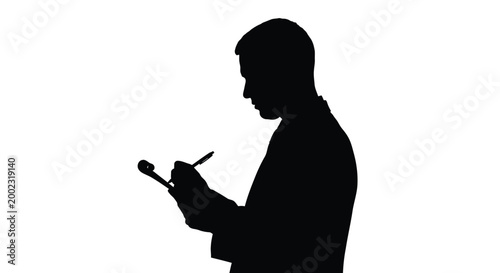 Silhouette of a man using a digital tablet and stylus in a vector graphic design
