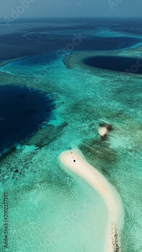 Aerial view of Maldives sandbar in turquoise lagoon