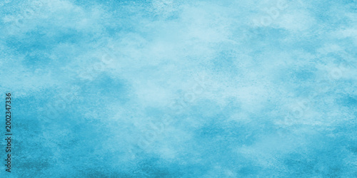 Soft blue cloudy texture background with white and grey shades vector
