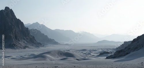 Vast desert valley with stark grey mountain ranges. Smooth sand dunes undulate across barren flatland under pale sky. Rocky peaks create dramatic horizon.