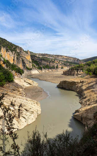 Scenic river canyon with low water level and limestone cliffs