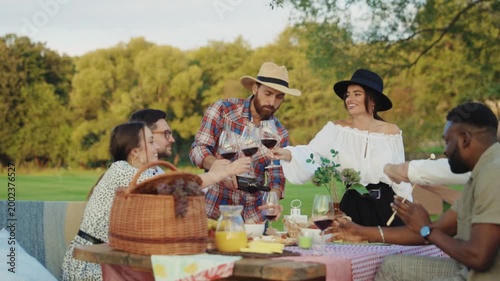 Experience a Joyful Outdoor Gathering with Friends, Delicious Food, and Good Vibes