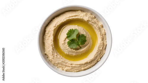 Принти на полотні Isolated bowl of creamy hummus topped with olive oil and fresh cilantro garnish