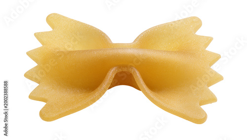 Fotografie Isolated single piece of traditional Italian dry Farfalle bow-tie pasta for cook
