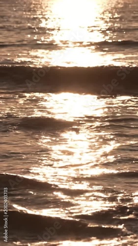 Golden Hour Ocean Shimmer Low angle, looking across the water towards the setting sun