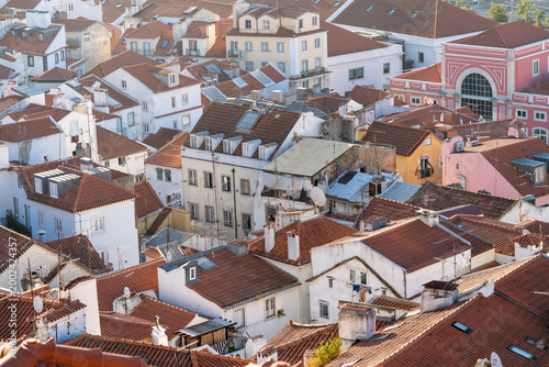 Morning light over rooftops in Alfama Lisbon