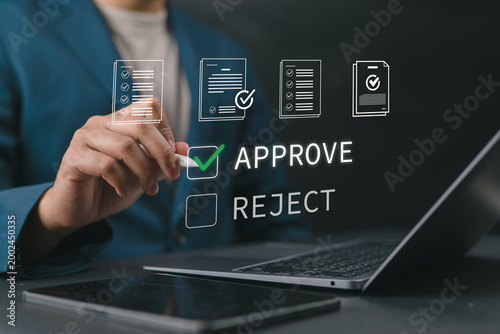 Obraz na plátně Digital document approval process with person confirming files on laptop, representing e-approval, online verification, workflow efficiency, and paperless office solutions