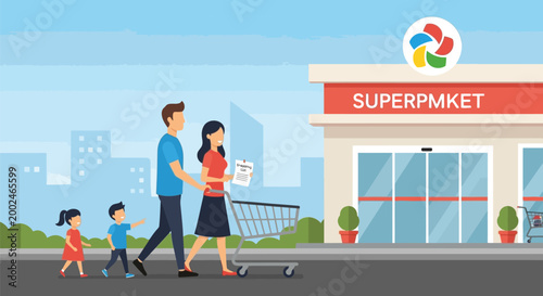 Happy young family with two children walking towards a supermarket with a shopping cart.