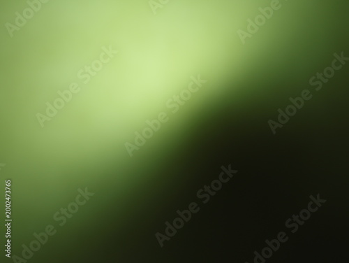 Obraz na plátně Una toma de cerca de un fondo abstracto de   color verde con negro con un degrad