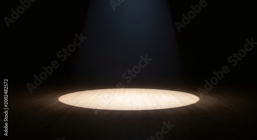 A dramatic spotlight illuminates an empty stage, creating a striking contrast of light and shadow, perfect for highlighting concepts, products, or creative presentations.