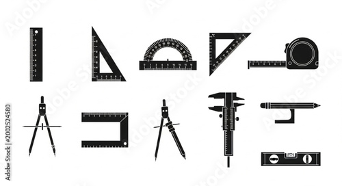 Collection of drafting and measuring tools in silhouette.