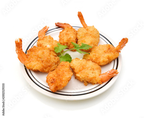 Stack butterfly shrimps in plate on white background 